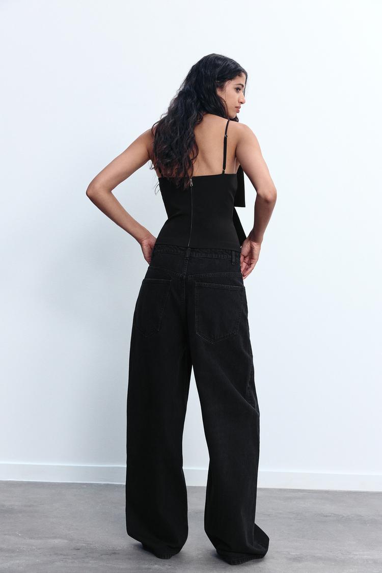 Loulou dames glitter top met strik | Zwarte pailletten top voor feesten & speciale gelegenheden