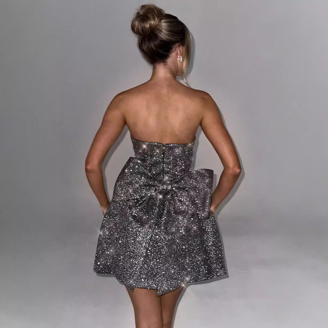 Paarse avondjurk voor dames | Lila-kleurige mini jurk met korsetveters & grote strik op de rug