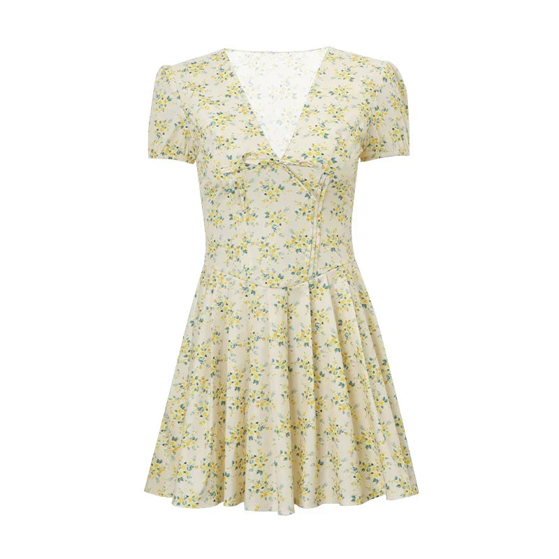 Romy zomerjurk voor dames | Korte bloemenjurk met pofmouwen & rugdecolleté met strik