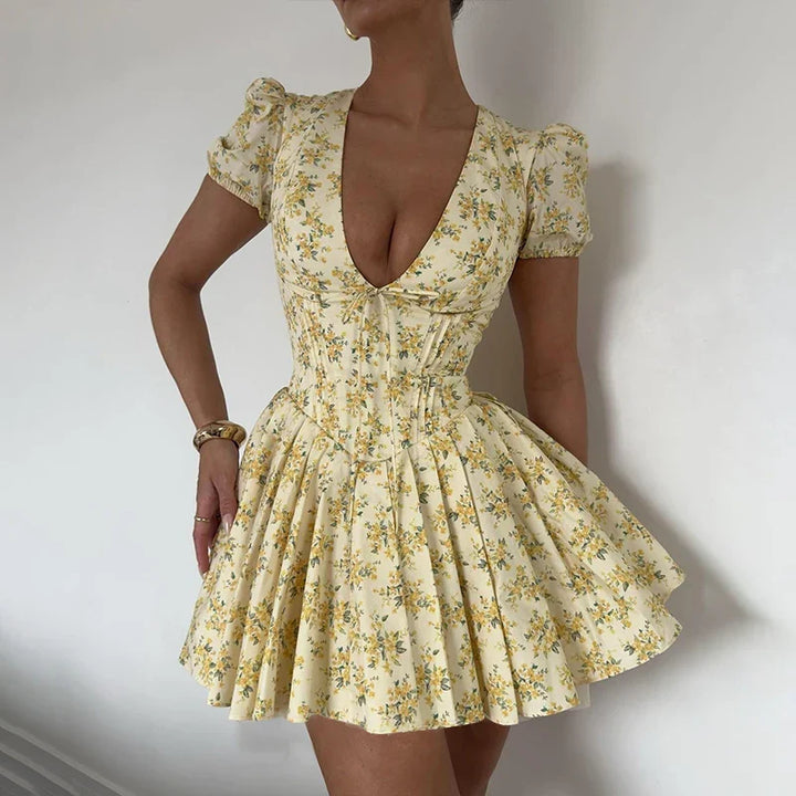 Romy zomerjurk voor dames | Korte bloemenjurk met pofmouwen & rugdecolleté met strik