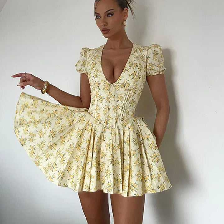 Romy zomerjurk voor dames | Korte bloemenjurk met pofmouwen & rugdecolleté met strik