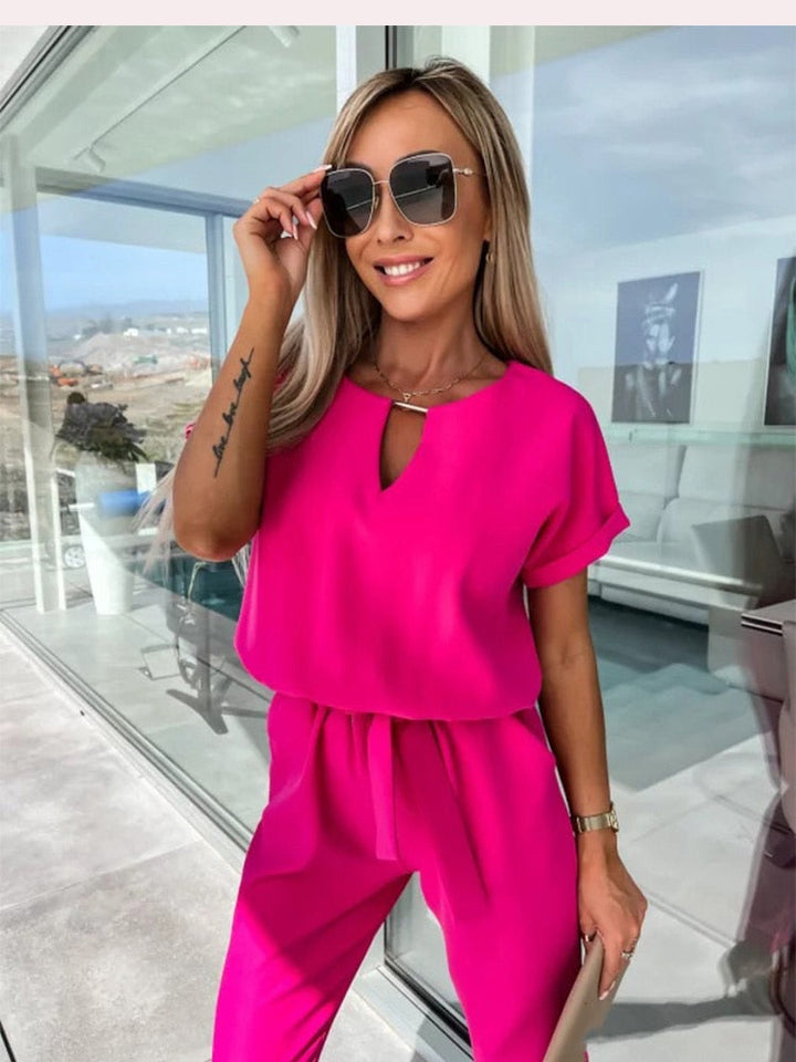 Elara dames jumpsuit met V-hals | Elegant eendelig stuk met strik & wijde pijpen