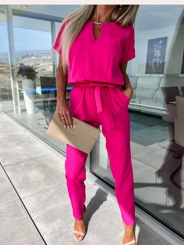 Elara dames jumpsuit met V-hals | Elegant eendelig stuk met strik & wijde pijpen