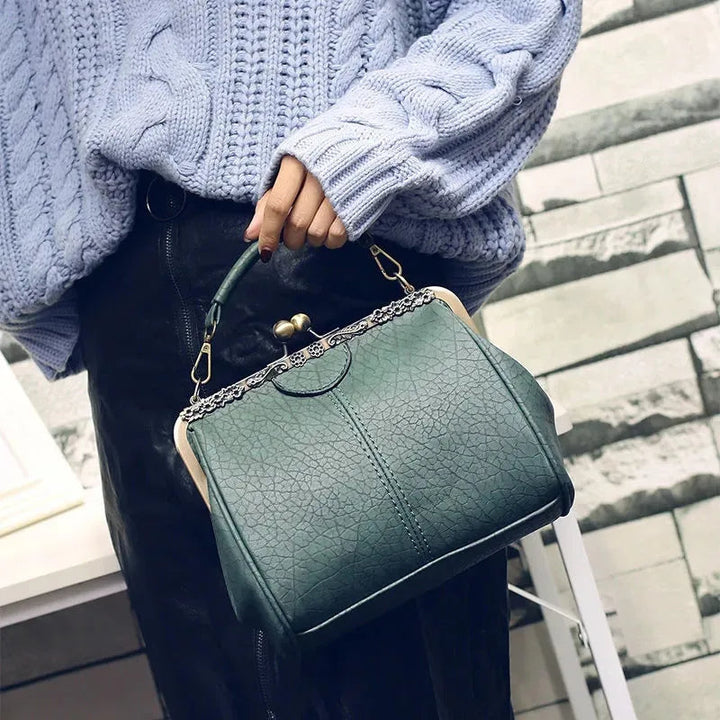 Coby | Klassieke handtas met clipsluiting voor dames - tijdloos, elegant & luxueus