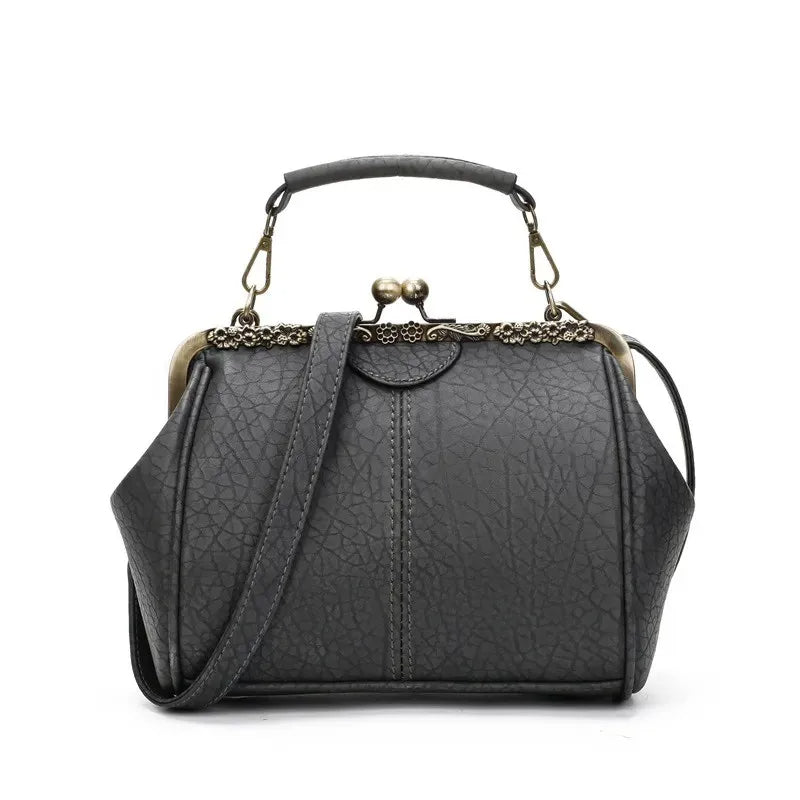 Coby | Klassieke handtas met clipsluiting voor dames - tijdloos, elegant & luxueus