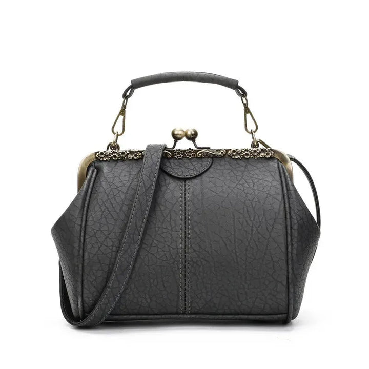 Coby | Klassieke handtas met clipsluiting voor dames - tijdloos, elegant & luxueus