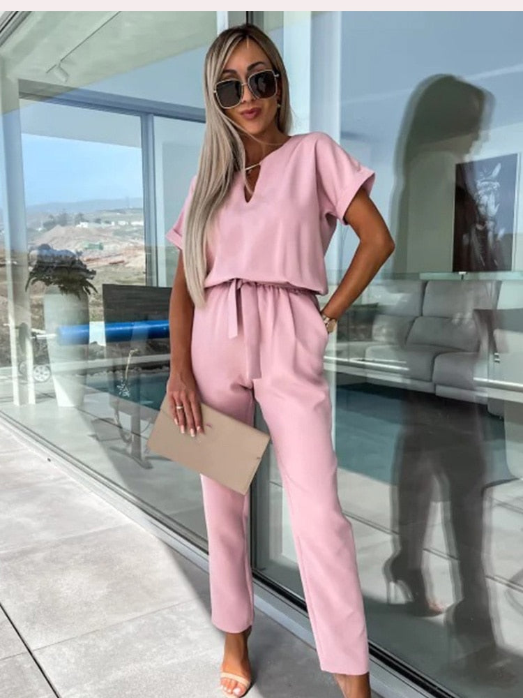 Elara dames jumpsuit met V-hals | Elegant eendelig stuk met strik & wijde pijpen
