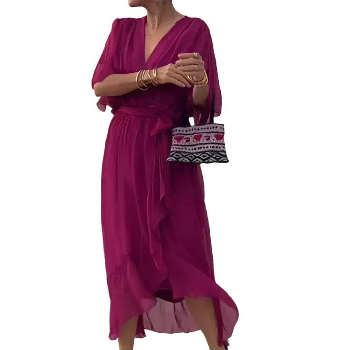 Laurie - Midi wikkeljurk met fladdermouwen en elegante details in de taille