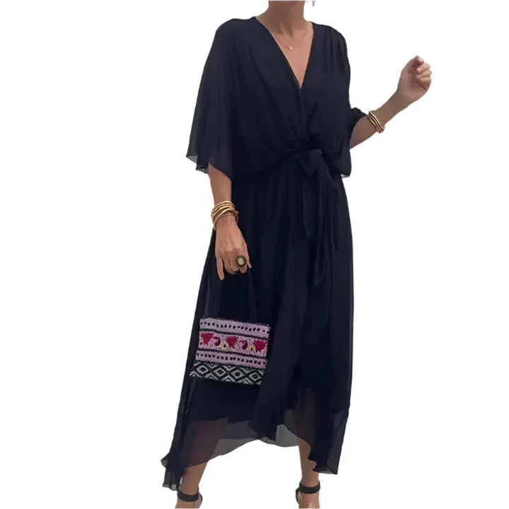 Laurie - Midi wikkeljurk met fladdermouwen en elegante details in de taille