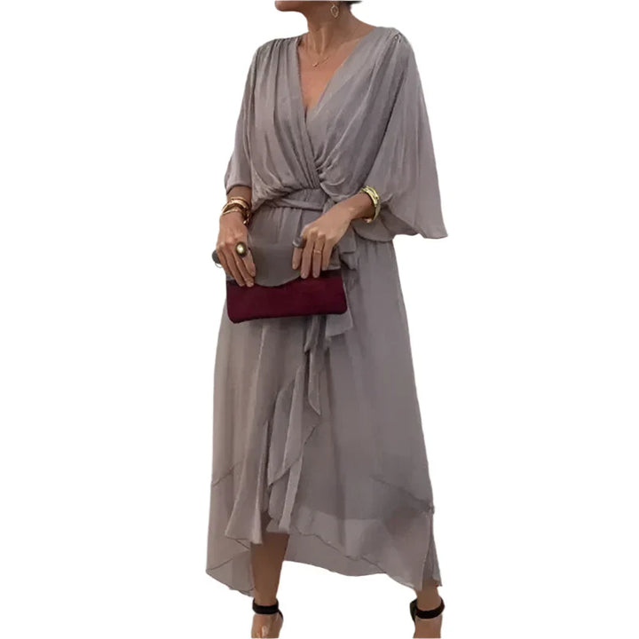 Laurie - Midi wikkeljurk met fladdermouwen en elegante details in de taille