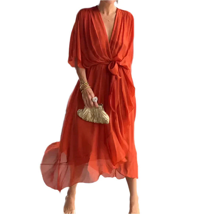Laurie - Midi wikkeljurk met fladdermouwen en elegante details in de taille