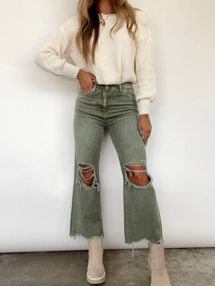 Xyrisa gescheurde jeans