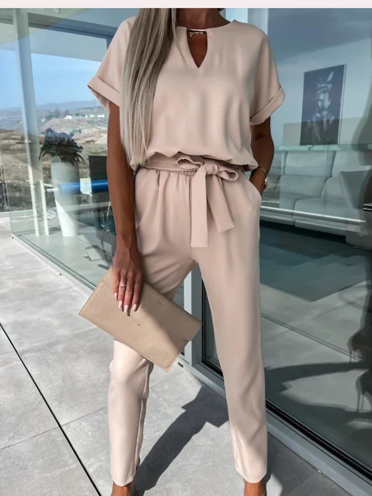 Elara dames jumpsuit met V-hals | Elegant eendelig stuk met strik & wijde pijpen