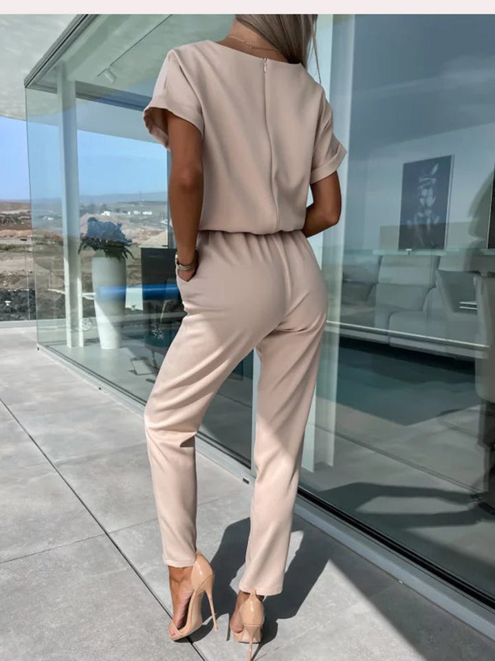 Elara dames jumpsuit met V-hals | Elegant eendelig stuk met strik & wijde pijpen